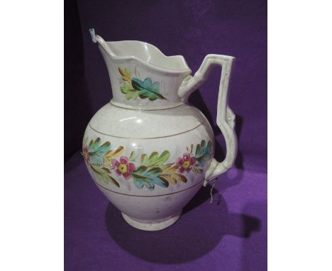 A vintage ceramic water jug with transfer print