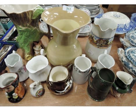 A selection of vintage jugs including Toby style