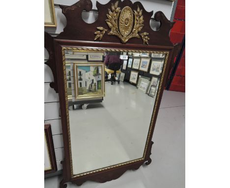A late 19th century mahogany frame wall mirror in the Chippendale revival style