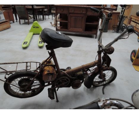 A vintage Raleigh Wisp moped in need of restoration spares and repairs 
