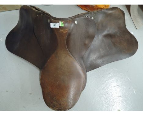 A vintage leather riding saddle in an English design