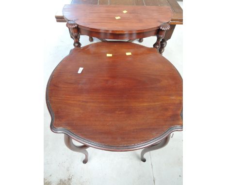 An early 20th Century mahogany occasional table and a reproduction hall table