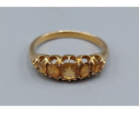 A 18ct gold five stone ring, 4.1gms, ring size Q