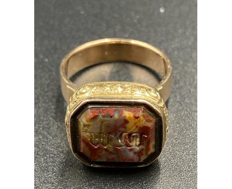 An untested gold ring with raised stone, probably an adapted seal. (Size L)