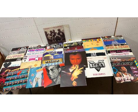 Approximately fifty LP, various years including Rolling Stones, Prince, Rem and Queen 