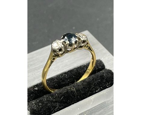 A Sapphire and diamond ring on a gold setting Size L