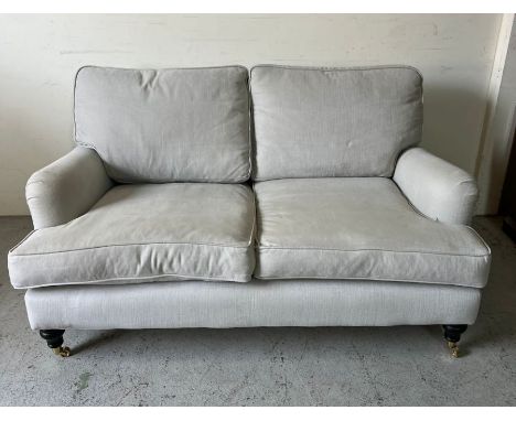 A two seater sofa (H80cm W150cm D95cm)