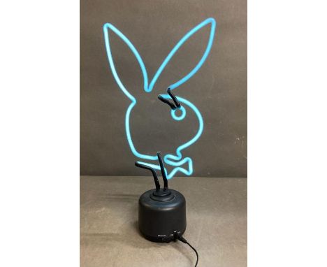 A Neon playboy bunny desk light 