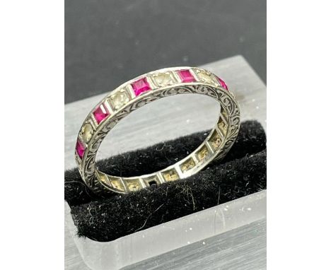 A 9ct gold ring AF with diamond and rubies. Size O