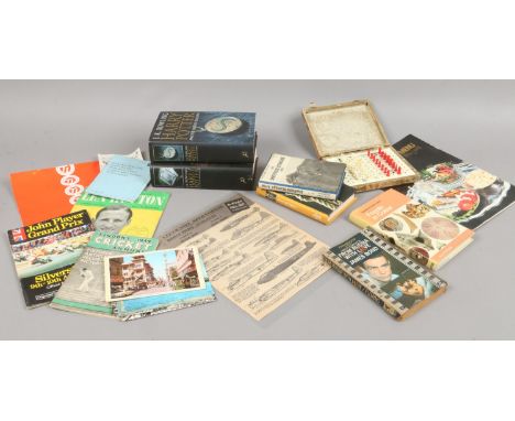 A box of mixed ephemera to include two first day edition Harry Potter books, postcards, sports annual / programme etc.