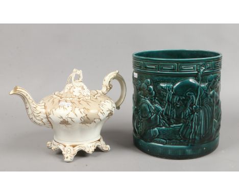 A Bretby Jardiniere with green glaze along with a Regency porcelain teapot.