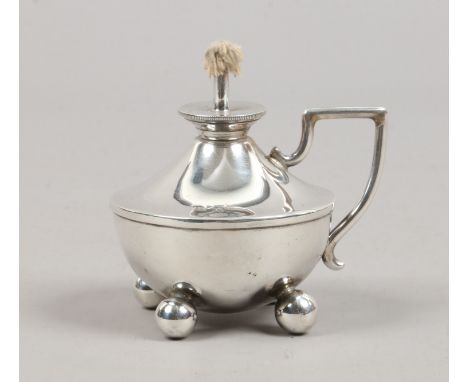 A silver chamberstick oil lamp assayed London 1911, gross weight 77.7 grams.