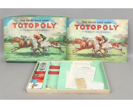 A vintage boxed John Waddington totopoly horse racing game.