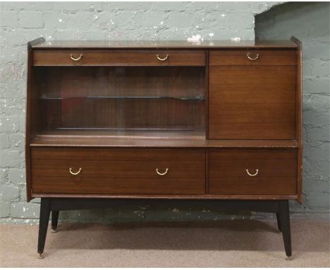 A vintage mahogany G plan Brandon sideboard display cocktail cabinet raised on painted legs.
