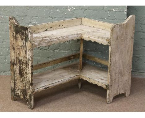 A vintage painted two tier pine corner shelf.