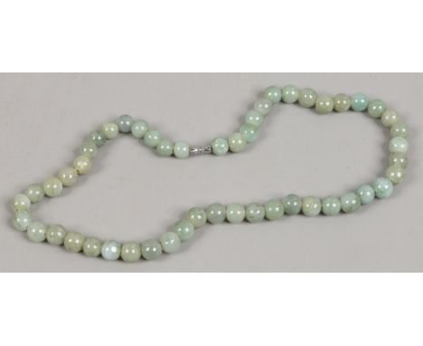A Celadon jade necklace.