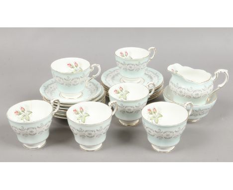 A Paragon six place tea service decorated with roses in the Radstock design.