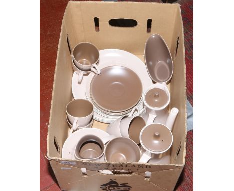 A collection of Poole pottery tea/dinner wares.