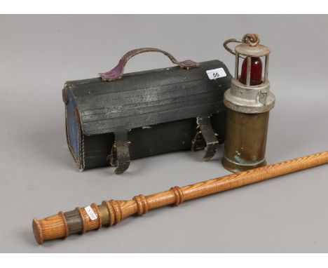 Colliers tool bag, brass safety lamp bearing broad arrow mark and a Brodsworth Colliery memorial stick.