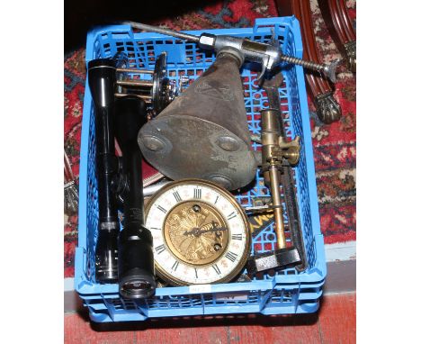 A box of mainly metalwares Red X oil fuel treatment dispenser, spring balance scales, fishing reel, Edwardian wall clock move