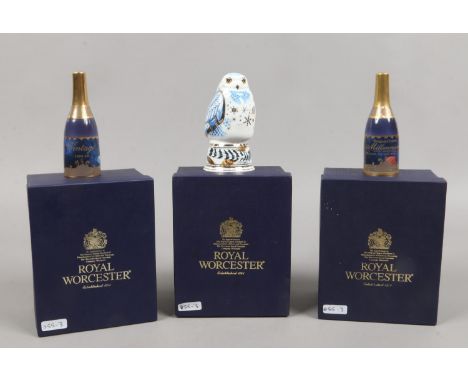 Three boxed Royal Worcester bone china candle snuffers, one as a snowy owl and two to commemorate The Millenium.