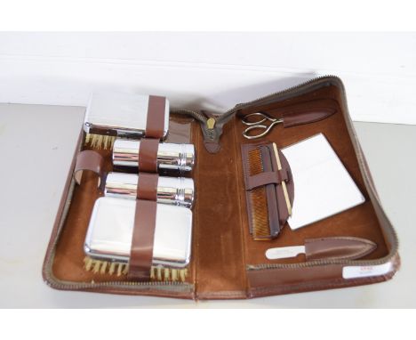 CASED LEATHER GENTLEMAN'S TOILET SET CONTAINING VARIOUS BRUSHES, SCISSORS, COMB ETC