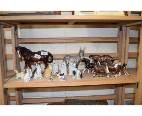 Quantity of model horses, donkeys and cats