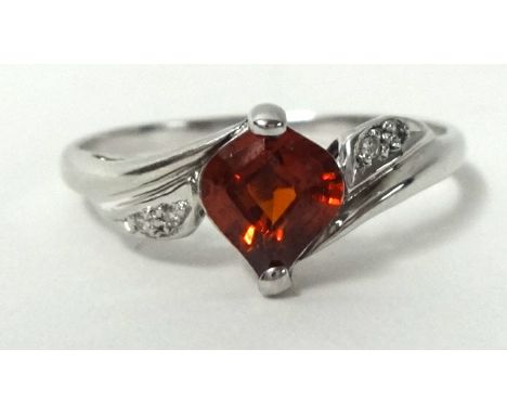 A white gold ring set with ruby style single stone, size S, stamped .750