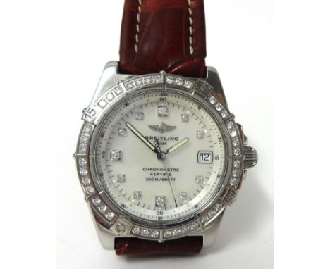 A Ladies Breitling wrist with diamond bezel and m.o.p. type dial, chronometer with original outer box and booklets, model No 