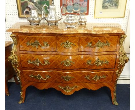 A reproduction Louis XV style bombe commode chest with marble type top fitted with and arrangement of five drawers with gilt 