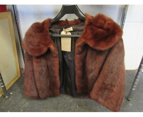 A vintage chestnut mink jacket     