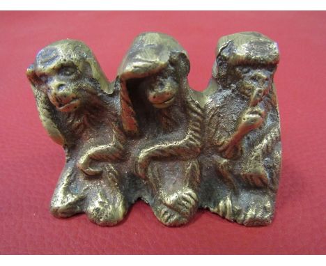 A vintage brass Three Wise Monkeys sculpture