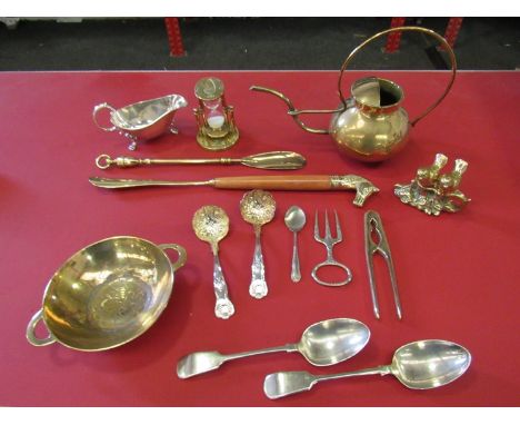 A selection of brass and plated wares including watering can, egg timer, nutcracker, shoe horns etc.