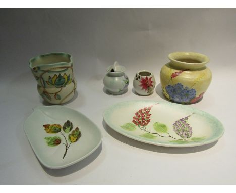 Six pieces of Radford pottery - three squat form vases, mustard pot and oval and leaf form dish, all with flower design