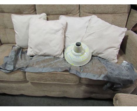 A set of four silver coloured cushions, table runner and a painted metal lamp shade