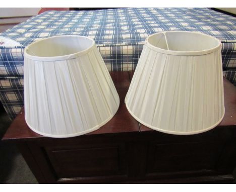 A pair of large cream silk pleated lamp shades, 41cm diameter x 28cm deep