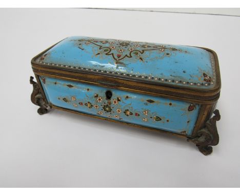A French enamel and gilt trinket box with floral detailing, scroll feet