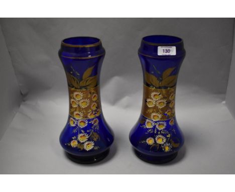 Two Victorian blue glass vases, having enamel daisy design, AF, some wear.