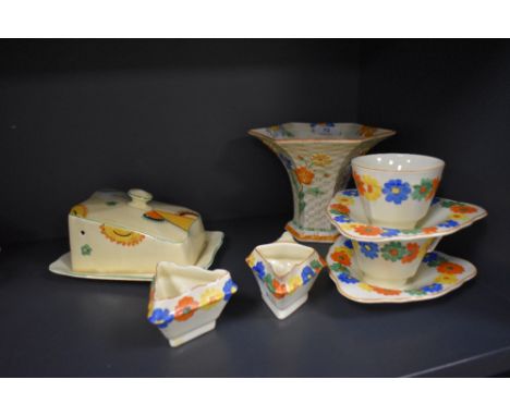 A selection of Art Deco items, to include stylised Crown Ducal cups and saucers, milk jug and sugar basin, a Crown Devon chee