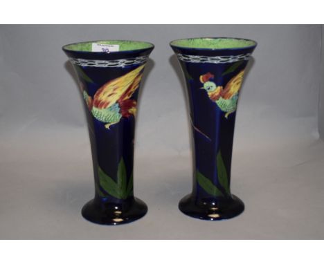 A pair of 1930s H &amp; K Tunstall vases of trumpet form, having decoration of pheasants and foliage.