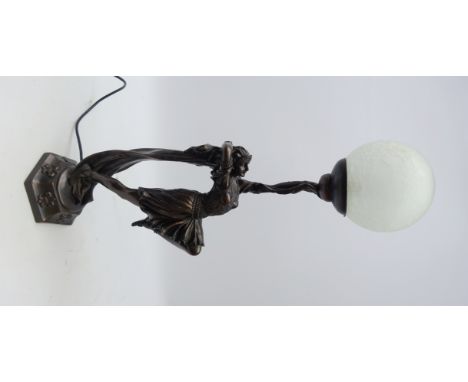 Art Deco style bronzed table lamp of a dancer, with globular frosted glass shade on hexagonal base, H70cm