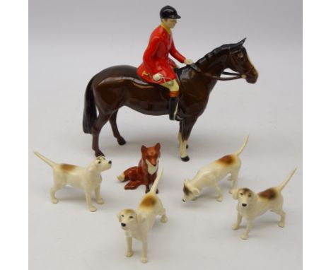 Beswick Hunting group; Huntsman on Bay horse model 1501, four  Hounds and Fox (6) Condition Report No damage. 