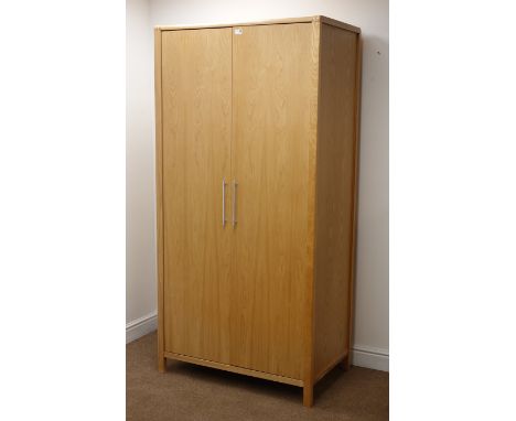 Modern light oak double wardrobe, two doors enclosing hanging rail and single shelf, stile supports, W93cm, H189cm, D59cm Con