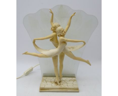 Art Deco style table lamp modelled as two Dancers with a glass Peacock Feather frosted diffuser, H44cm 