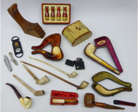 Collection of pipes and smoking paraphernalia - set of four Eono graduated mouthpieces, with gold plated mounts boxed, cased 