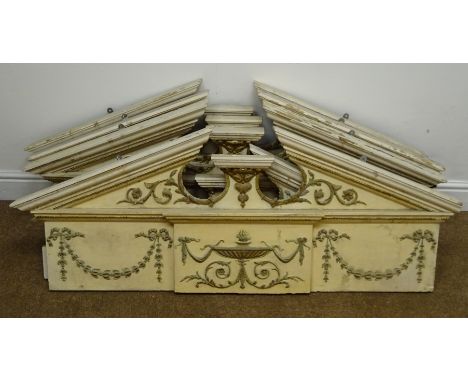 Five white and gilt architectural door mantles, broken arch pediment, classical urn and floral swags, W129cm, H50cm, D7cm Con