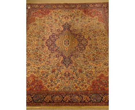 Large early 20th century Wilton rug carpet, central medallion, floral field, repeating border, 361cm x 315cm Condition Report