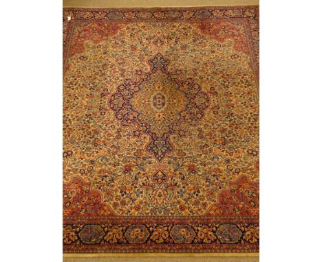 Large early 20th century Wilton rug carpet, central medallion, floral field, repeating border, 361cm x 315cm Condition Report