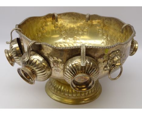 Silver-plated pedestal punch bowl, gadroon shaped rim with two lion mask ring handles and six cups, D35cm 