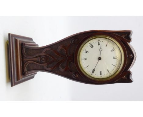 Early 20th century French mahogany mantle clock, carved balloon shaped case, circular roman numeral dial, eight day spring dr